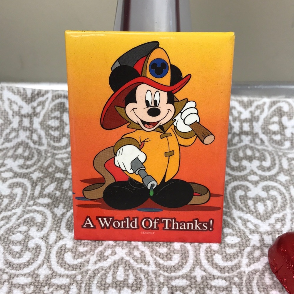 A world of Thanks button collectible from Disney